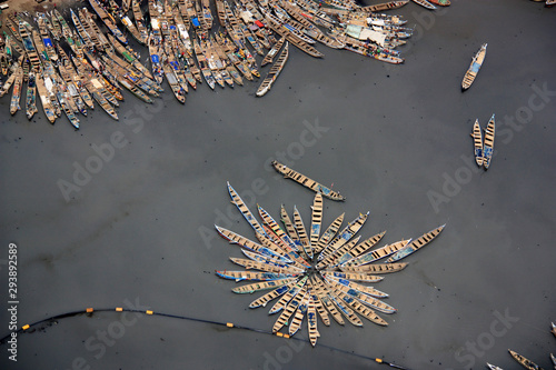 Aerial view of fishing boats moored together in the port of Tema, Greater Accra, Ghana