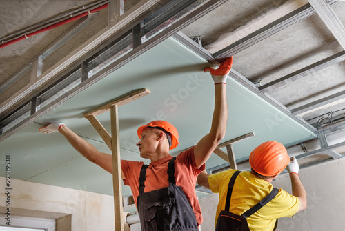 Canvas-taulu Installation of ceiling drywall.