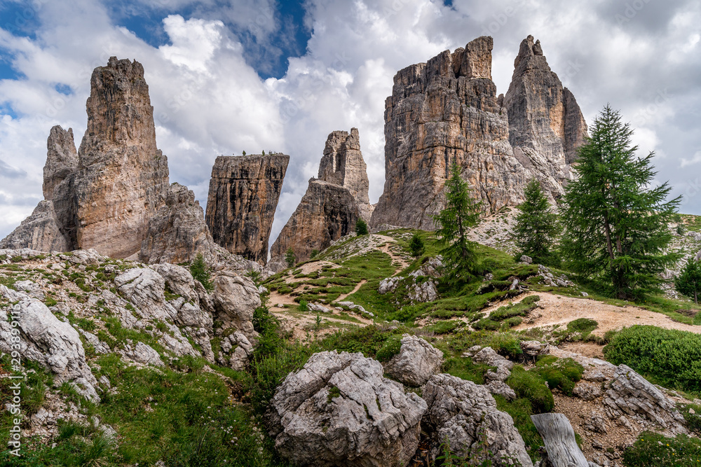 A rocky landscape of Cinque Torri in a sunny day at the Dolomites Alps in Italy. A rocky landscape of Cinque Torri in a sunny day at the Dolomites Alps in Italy.