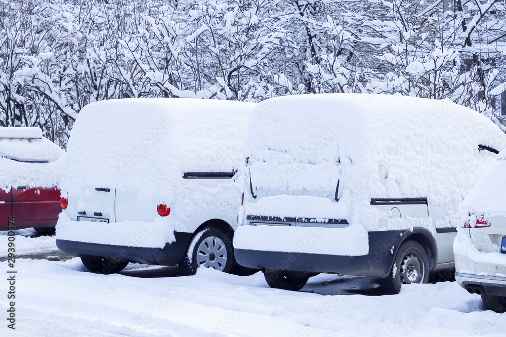 Cars covered with a thick layer of snow. Cars covered with a thick layer of snow.