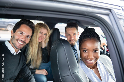 Portrait Of Multi Racial Friends Sitting In Car © Andrey Popov