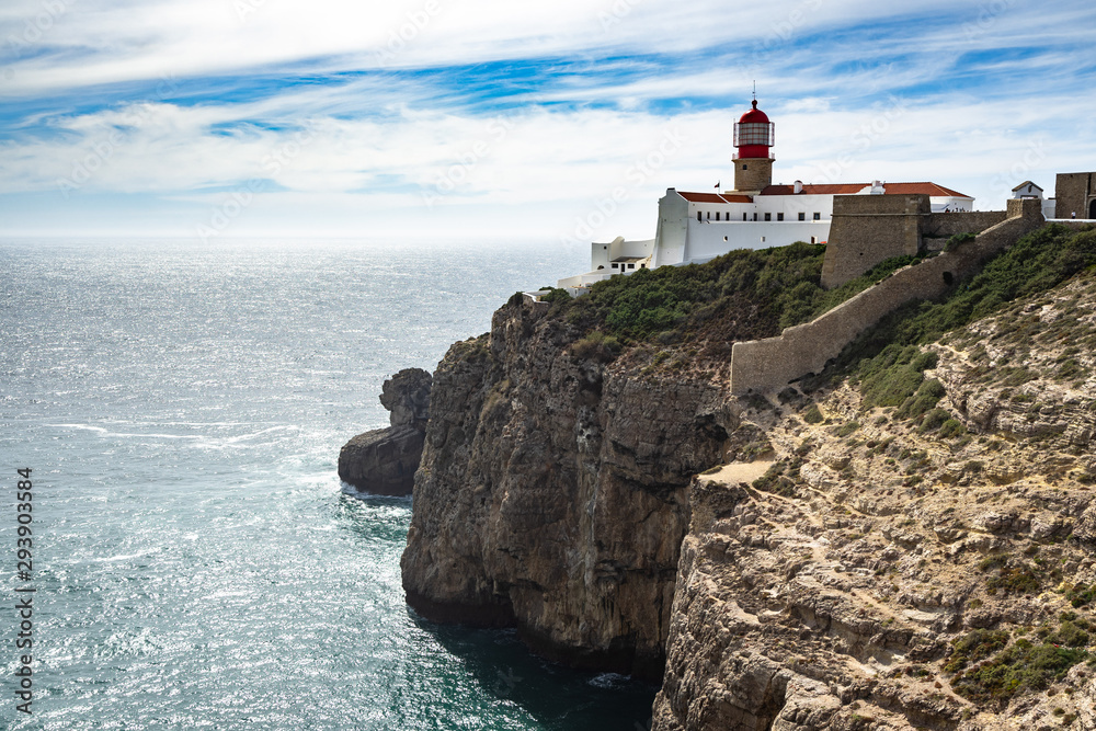 The scenic lighthouse on the cliffs of Cabo de Sao Vicente(Cape St. Vincent) overlooking the Atalntic Ocean at the southwesternmost point of Portugal, Algarve