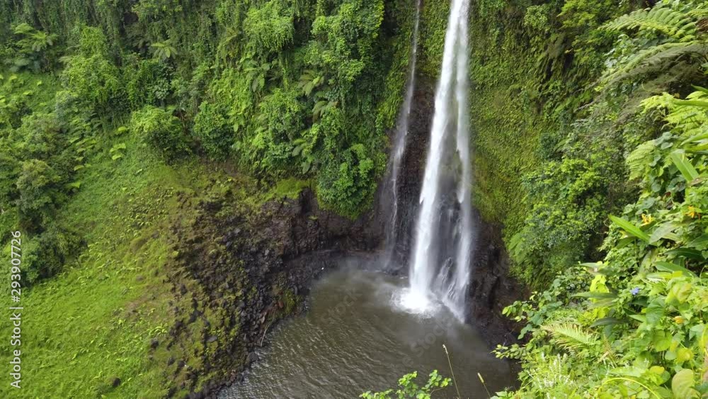 Fuipisia Waterfall in Samoa amongst the lush green landscape, Panning from left to right Fuipisia Waterfall in Samoa amongst the lush green landscape, Panning from left to right