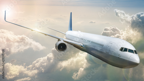 modern airliner over the clouds photo