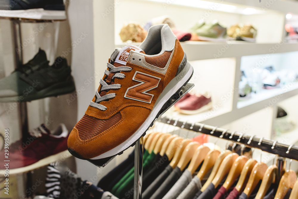 Valencia, Spain - January 2, 2019: New Balance sneakers shown in the shop  window of a sports and clothing store on Avenida Colon in Valencia, Spain.  Stock Photo | Adobe Stock