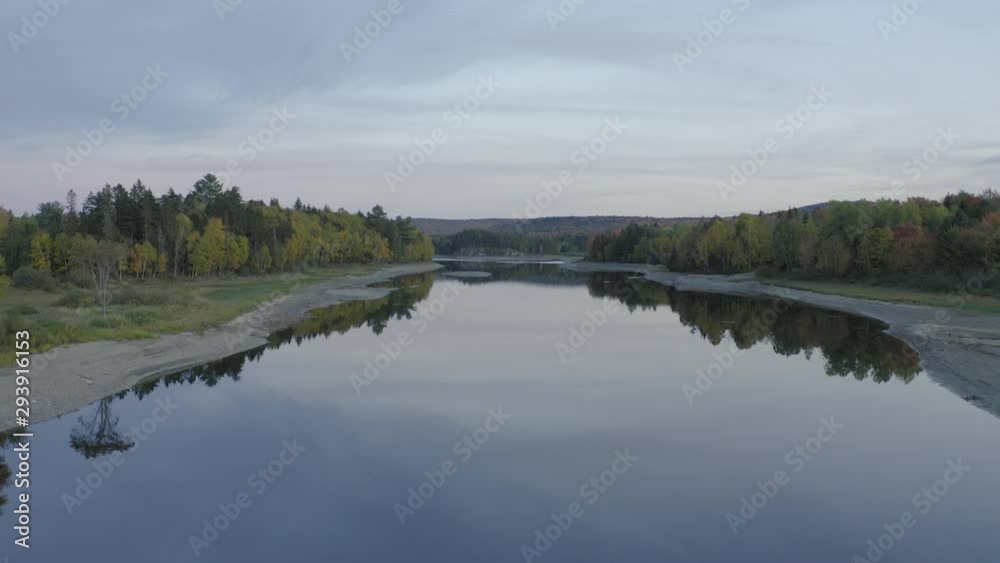 Centered aerial flying up lake Sebookmook flat calm water Centered aerial flying up lake Sebookmook flat calm water