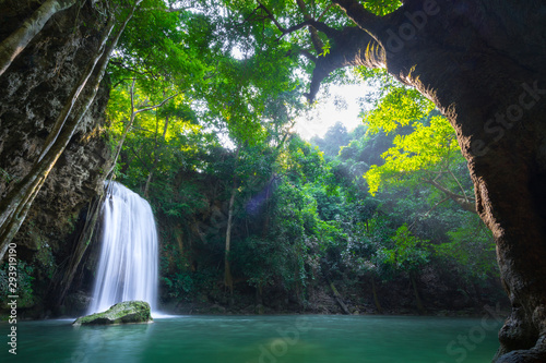 Fototapeta Naklejka Na Ścianę i Meble -  Erawan waterfall and national park which is one of famous travel destination in Kanchanaburi - Thailand. Photo contain ghost-flare due to sunlight. Long exposure shutter, for smooth water. 