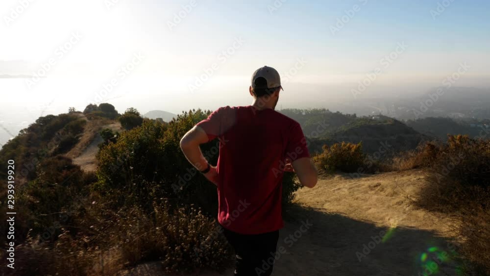 A man going for his moring workout in the hills above Hallywood