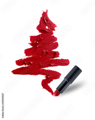 Christmas tree of red lipstick smeared. Beauty cosmetic creative concept