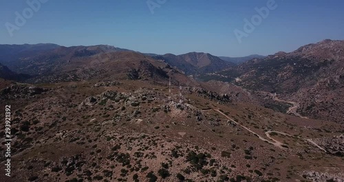 View Of Telecommunications Mast On Hill In Palaiochora, Crete. Aerial Ascending photo
