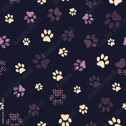 Seamless pattern with patterned paws. Complex illustration print in yellow, lilac, purple, grey and black.