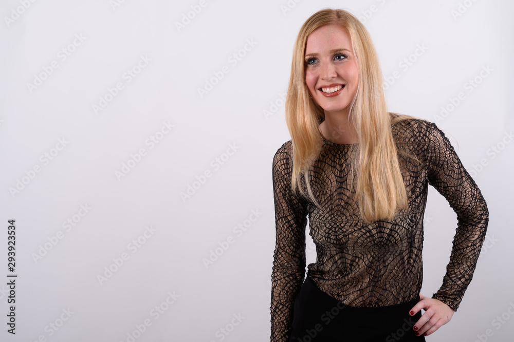 Young beautiful British woman with blond hair against white background Young beautiful British woman with blond hair against white background