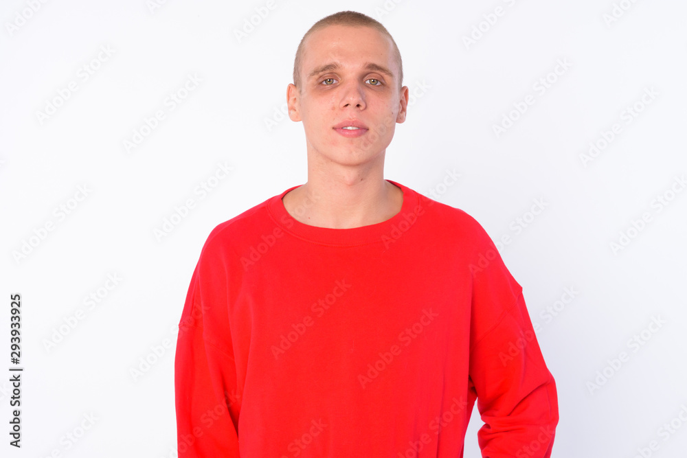 Portrait of young bald man looking at camera Portrait of young bald man looking at camera