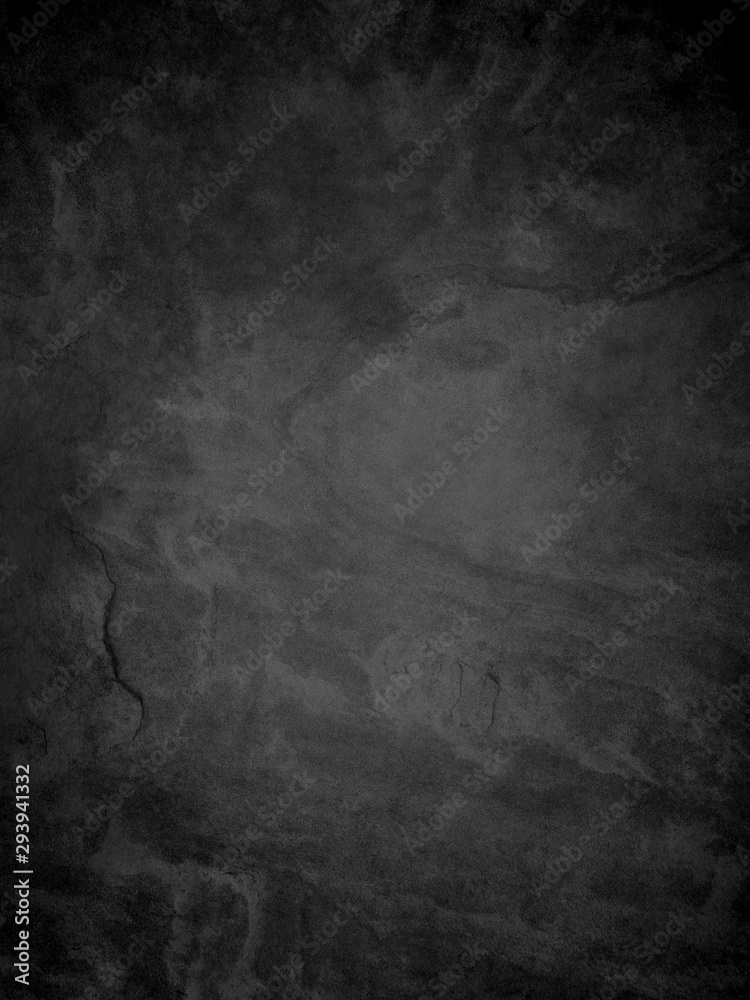 black textured background in stone or rock wall grunge design, old distressed vintage background in dark monochrome colors