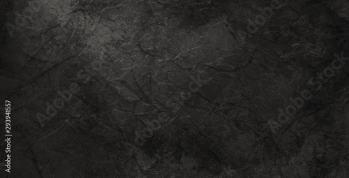 Black crackled background texture and grunge, elegant old vintage background design with soft lighting in black and white shades of gray for graphic art project designs