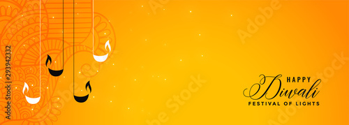 lovely happy diwali yellow banner design with diya