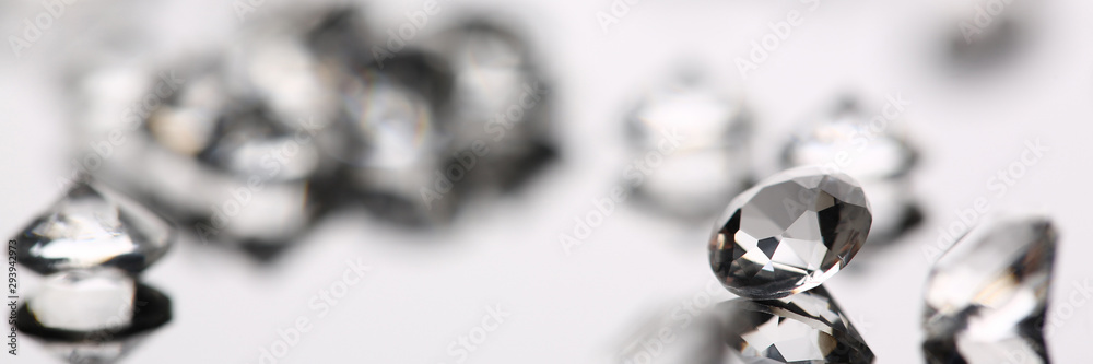 Scattering of white star diamonds on black background table jeweler concept Scattering of white star diamonds on black background table jeweler concept