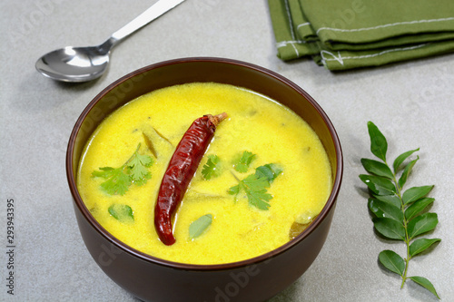 Obraz na plátně Kadhi is a yogurt based indian spicy dish eaten with roti or rice