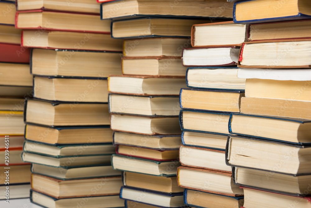 Stack of books background. many books piles. Stack of books background. many books piles.