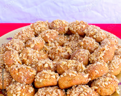 "melomakarona" traditional Greek Christmas cookies with honey syrup and nuts, top view