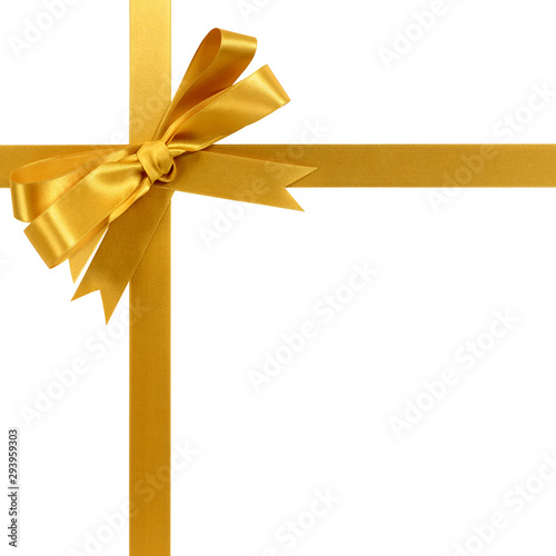 Gold gift ribbon and bow isolated on white