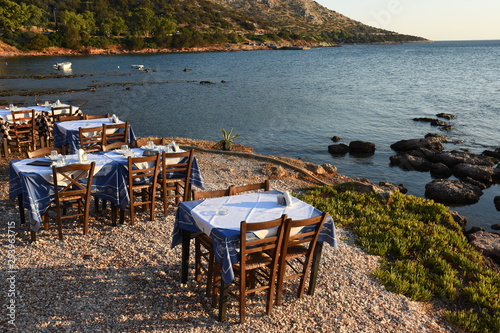 Fototapeta Naklejka Na Ścianę i Meble -  sunset beach restaurant at Anavyssos in Greece