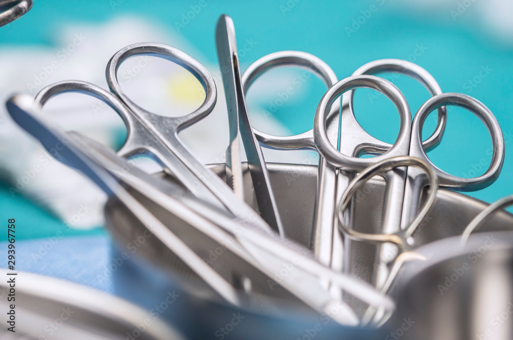 Some scissors for surgery on a tray, conceptual image, horizontal composition Some scissors for surgery on a tray, conceptual image, horizontal composition