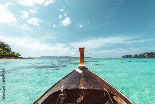 Long tail boat front with beautiful clear sea of thailand