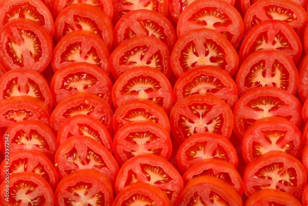Sliced tomato background. Top view.