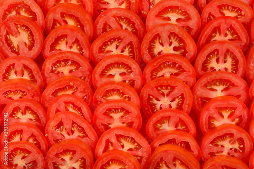 Sliced tomato background. Top view.