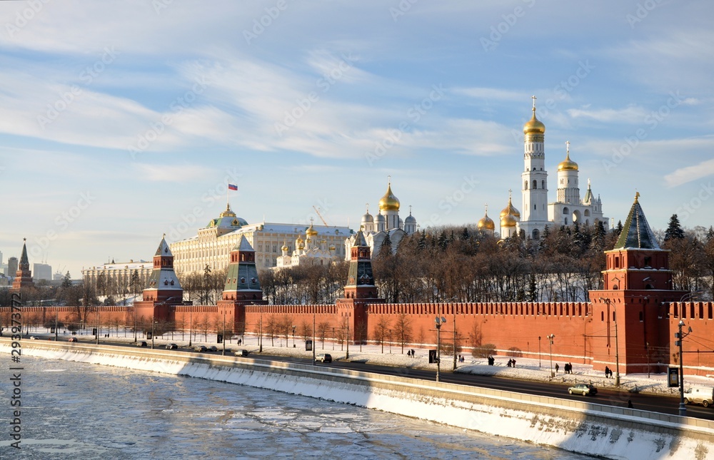 the Moscow Kremlin at winter Cathedral landscape embankment. Moskva river with sunny weather. Churches. And goverment building