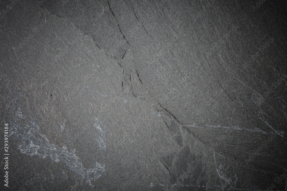 Naklejka premium Dark grey and black slate background or texture