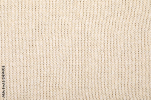 Beige melange knitting fabric textured background