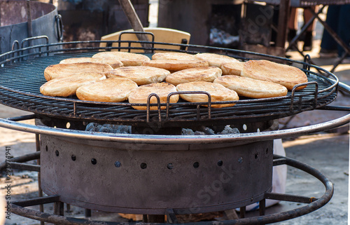Armenian cakes are grilled on the street during a festival in Ukraine photo
