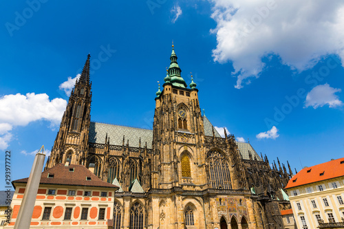Prague, bell gothic towers and St. Vitus Cathedral. St. Vitus is a Roman Catholic cathedral in Prague, Czech Republic. Panoramic view from the courtyard to the south facade. Prague, Czechia.