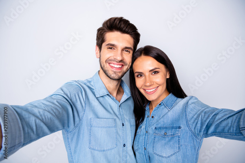Self-portrait of his he her she nice attractive charming cute lovely winsome cheerful cheery couple bonding spending time isolated over light white gray pastel color background