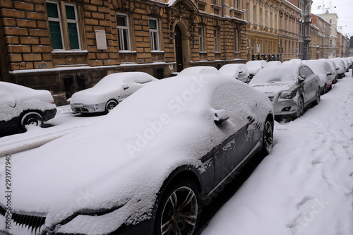 Snow covered car parked in streets of Zagreb, Croatia 