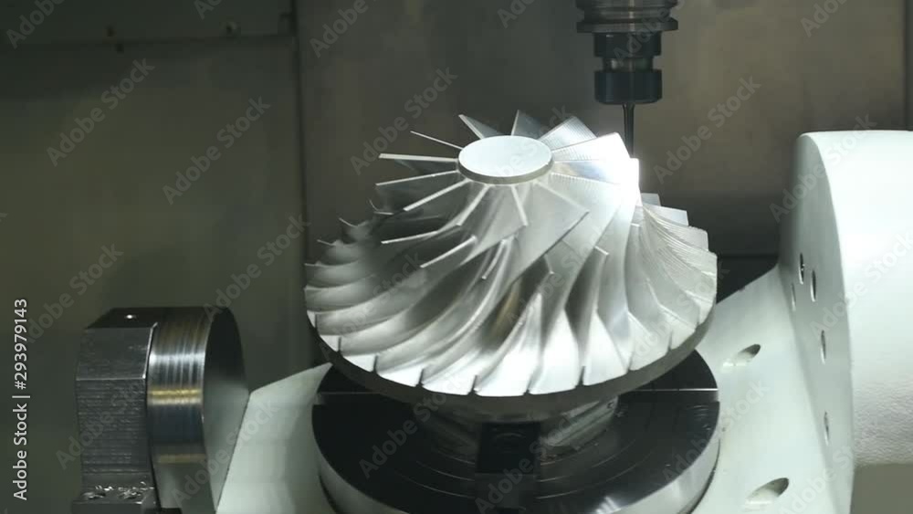 CNC milling machine work. Five axis impeller machining in metalwork industry