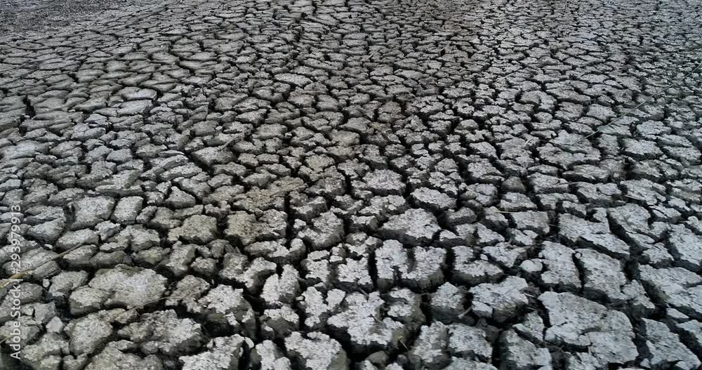 Dry lake bed with natural texture of cracked clay in perspective floor Dry lake bed with natural texture of cracked clay in perspective floor