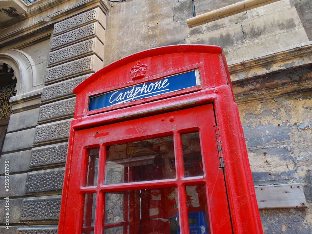 Red telephone cabin in La Valletta street, Malta Red telephone cabin in La Valletta street, Malta