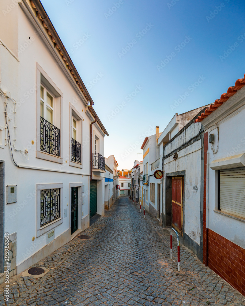 Street in the old town in the center of Lagos, Algarve region, Portugal. Narrow street in Lagos, Algarve, Portugal. Streets in the historic old town of Lagos, Algarve, Portugal.