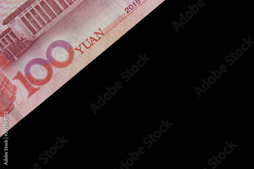 one hundred yuan on a black background