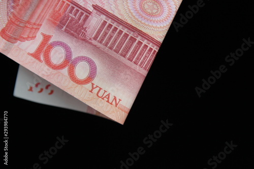 yuan in an envelope on a black background