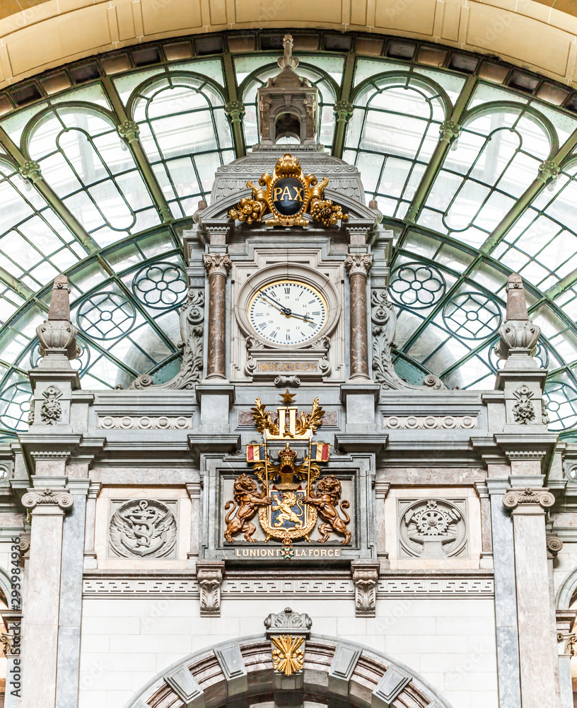 Restored main vintage clock at the Antwerp Train Station, Belgium, 2019. 