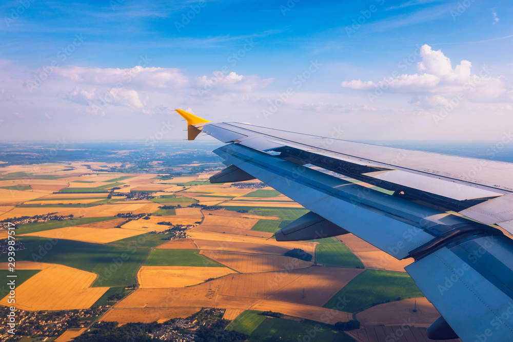 Airplane windows view above the earth on landmark down. View from an