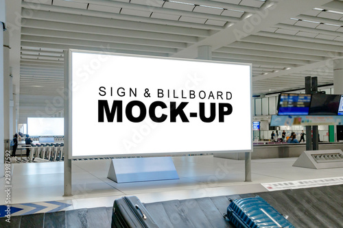 Mock up large blank horizontal billboard at baggage claim point