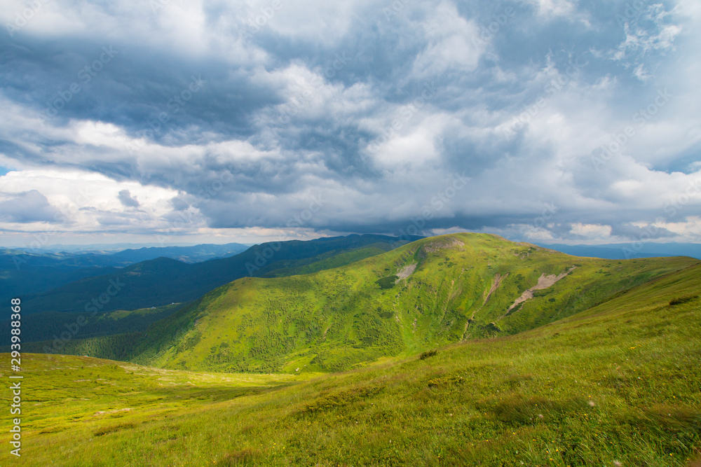 Green Mountain and Stormy Sky Landscape
