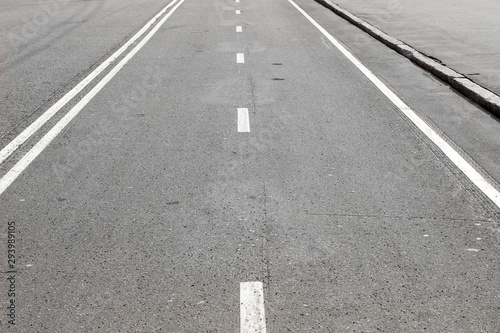 Wallpaper Mural An empty road with white road marking Torontodigital.ca