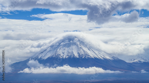 View of the Licancabur volcano covered by clouds and snow, Atacama Desert, Chile © Marco Ramerini