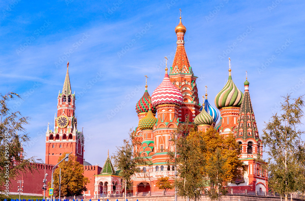 Spasskaya Tower, the Moscow Kremlin and St. Basil's Cathedral. Architecture and sights of Moscow.
